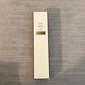 Oribe Free Styler Hairspray in Cream and Black